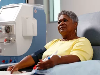 Female patient receiving HDx therapy in a hospital 