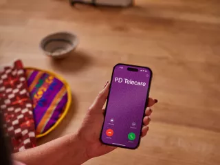 PD Telecare displays on a mobile phone showing that number is being called